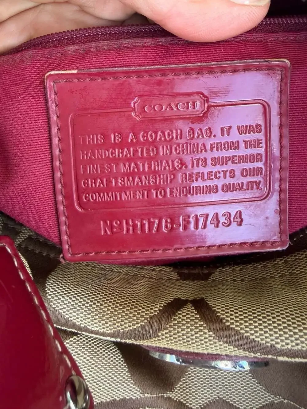 Coach signature stripe hobo bag in burgundy